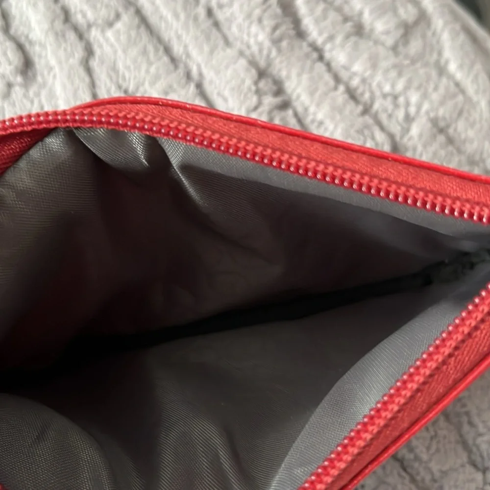 Red clutch bag